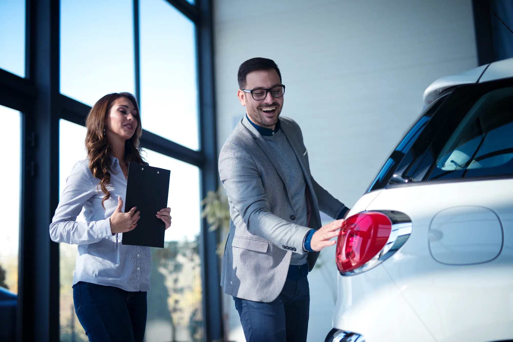 Car financing advisor assisting customers with vehicle approval at Value Car Deals serving the Lower Mainland region of Canada